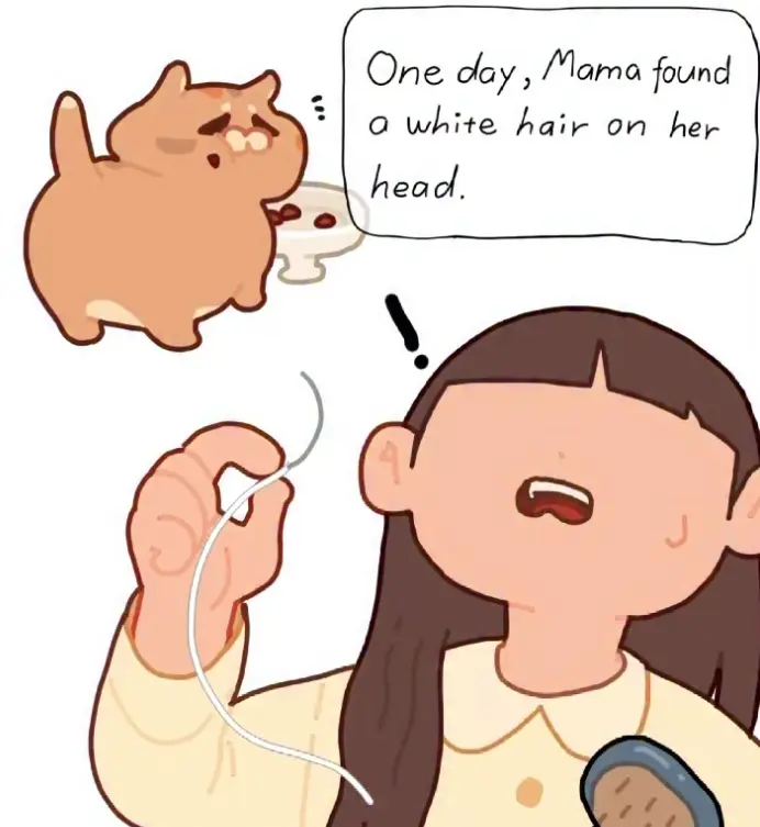 Comic panel of 光噹 drawn as a round cartoon cat beside her human, who holds up a single white hair; the caption reads “One day, Mama found a white hair on her head.”